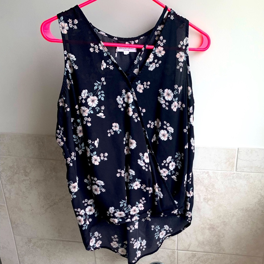 Sleeveless blouse size L